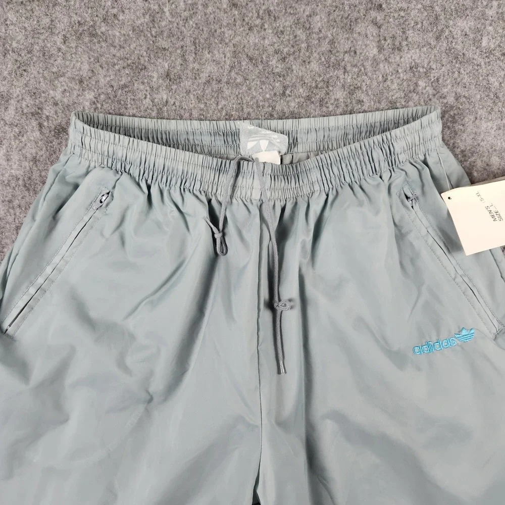 VTG NWT 80s 90 Adidas One World Track Pants Men L Blue Trefoil Nylon Windbreaker